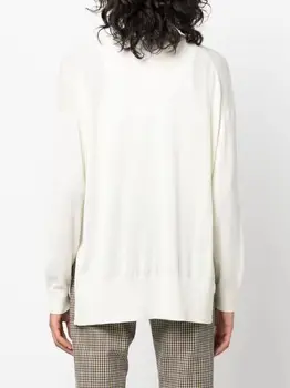 Жена с жилетка, монофонични однобортный пуловер прости плетени с V-образно деколте и цепка по дъното, с дълъг ръкав